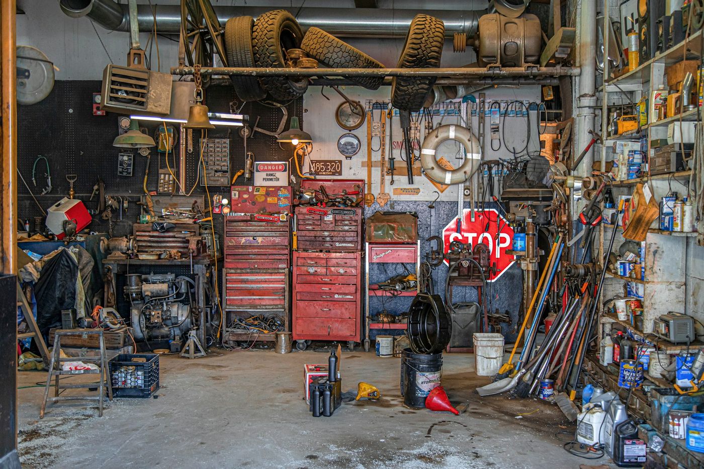 Cluttered garage packed with boxes and clutter